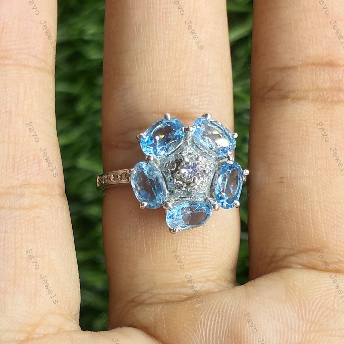 Swiss Blue Topaz Flower Ring: Sterling Silver November Birthstone