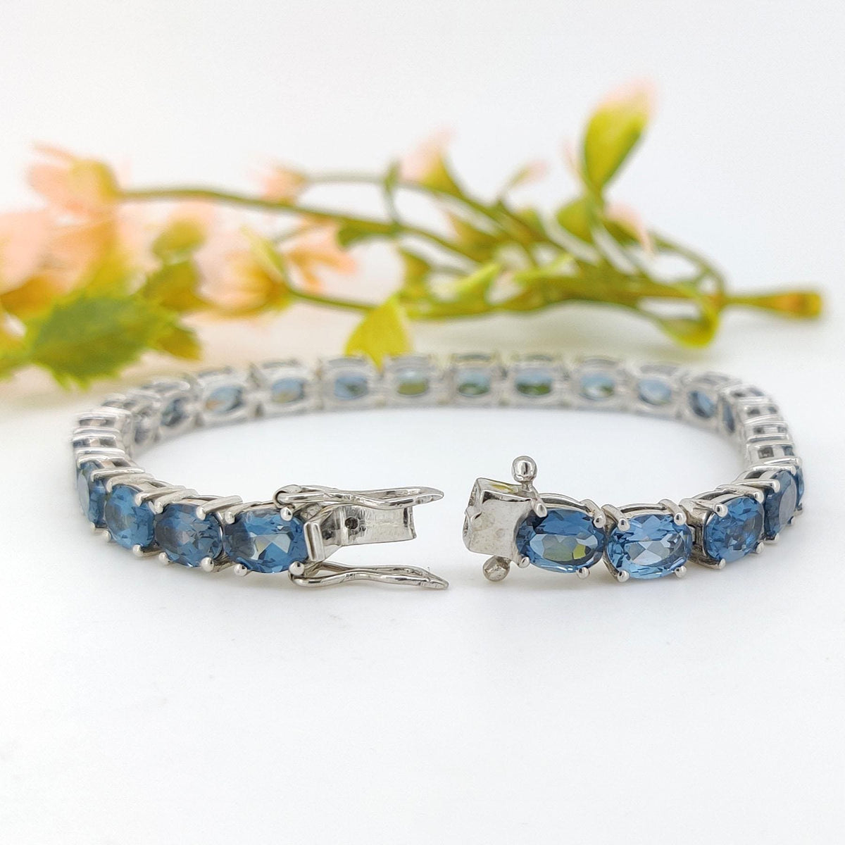 London Blue Topaz Tennis Bracelet: Sterling Silver Oval Gemstone, December Birthstone