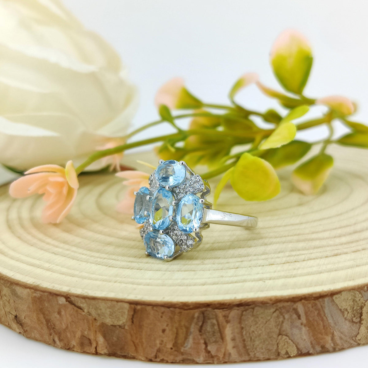 Blue Topaz Flower Ring: Sterling Silver December Birthstone