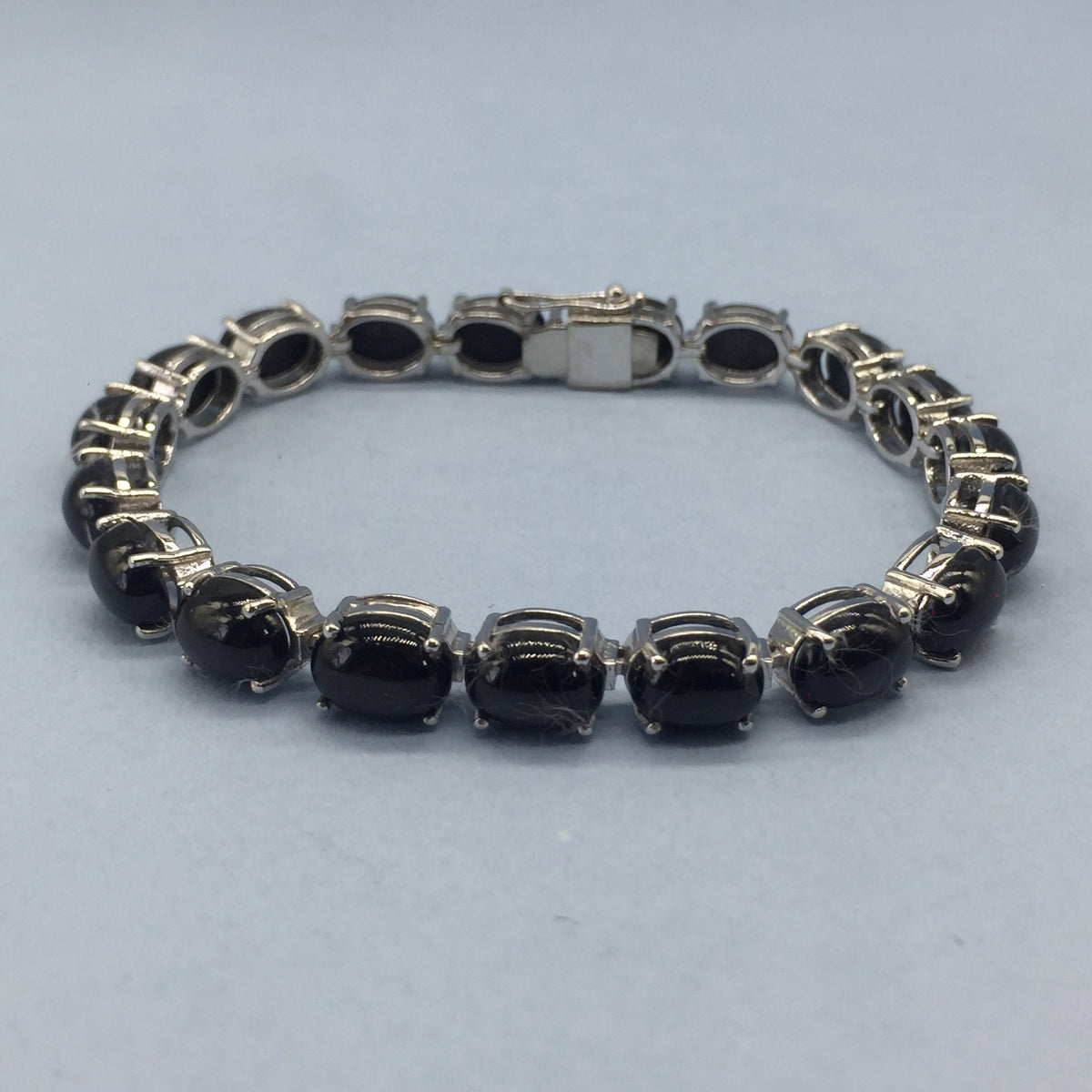 Natural Black Star Oval Cabochon Sterling Silver Bracelet