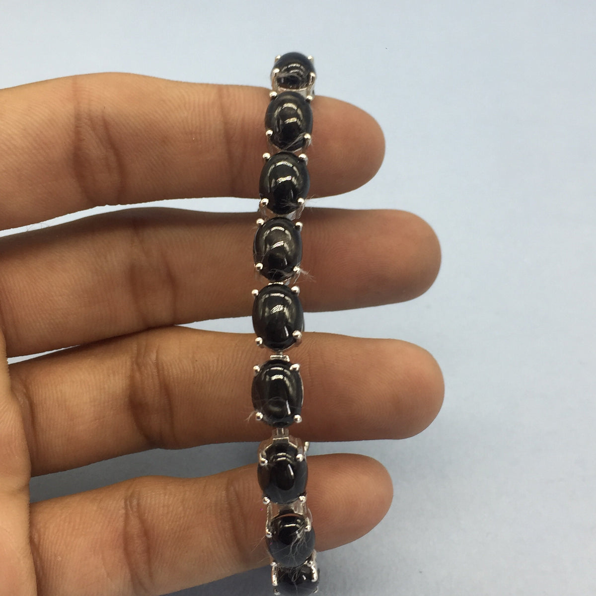 Natural Black Star Oval Cabochon Sterling Silver Bracelet