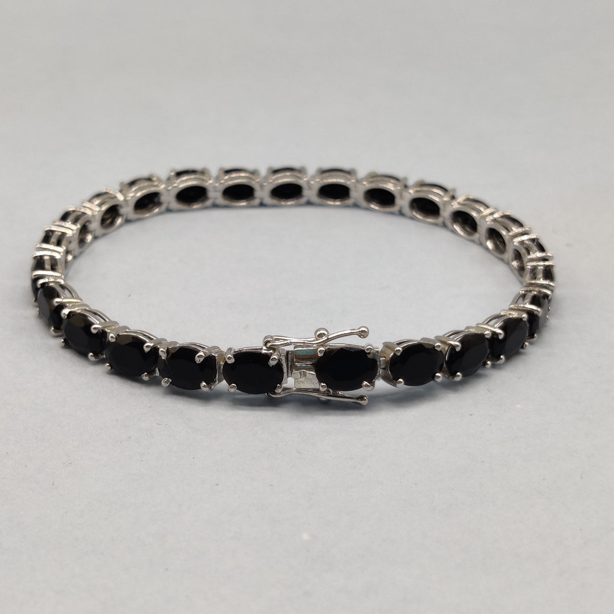 Black Onyx Tennis Bracelet: Oval Gemstone, 925 Sterling Silver