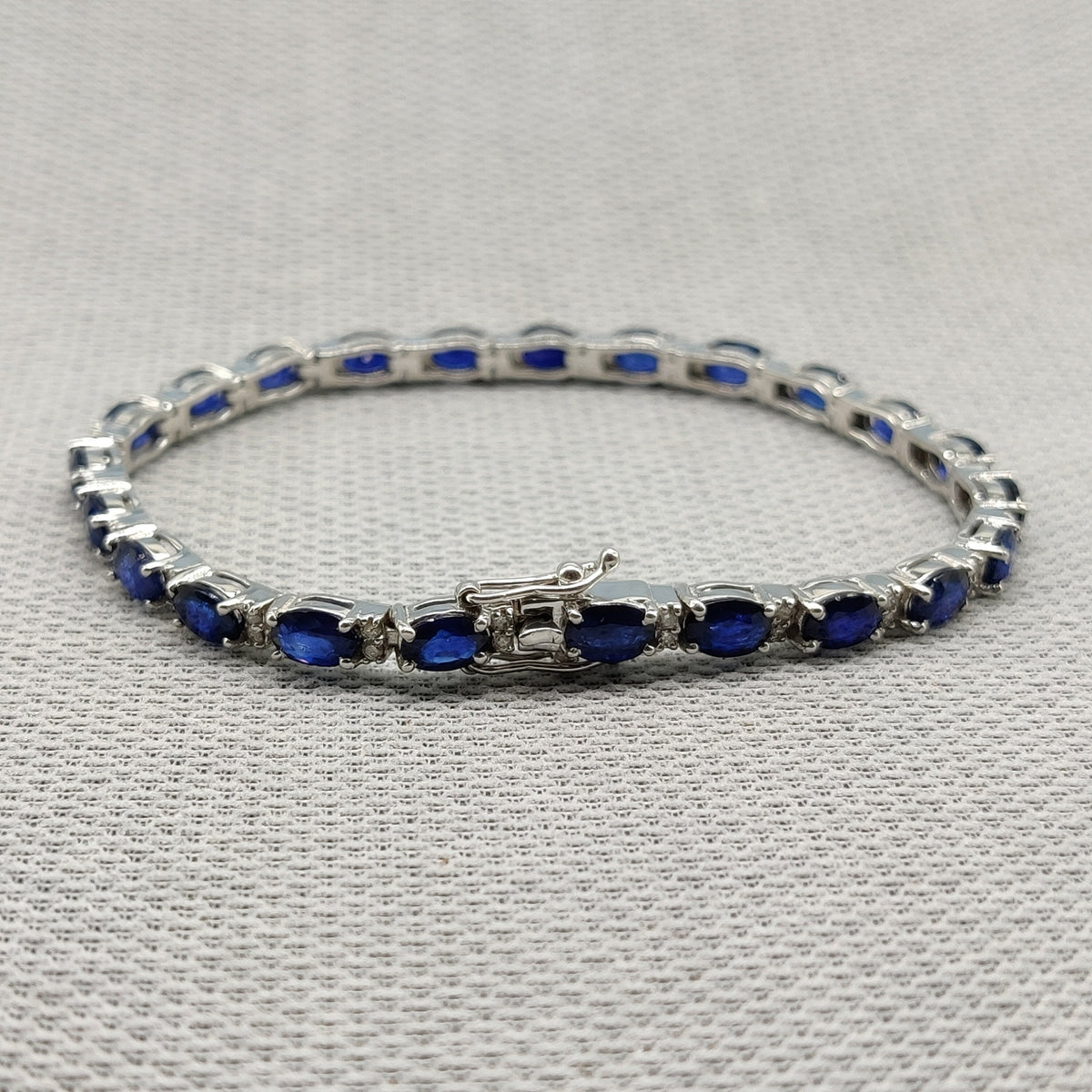 Oval Faceted Blue Sapphire Tennis Bracelet, 925 Sterling Silver, 7x5mm Stones