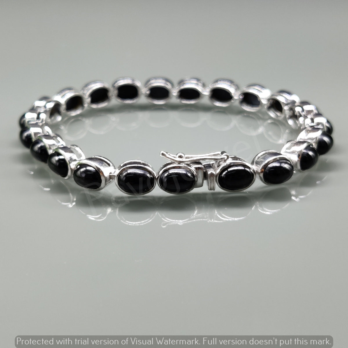Natural Black Star Oval Cabochon Sterling Silver Bracelet, Tennis Style