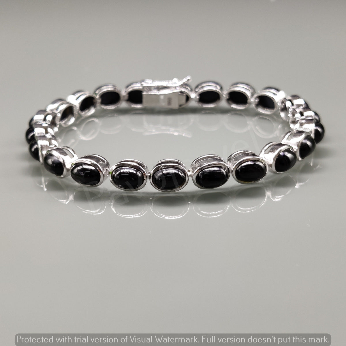 Natural Black Star Oval Cabochon Sterling Silver Bracelet, Tennis Style
