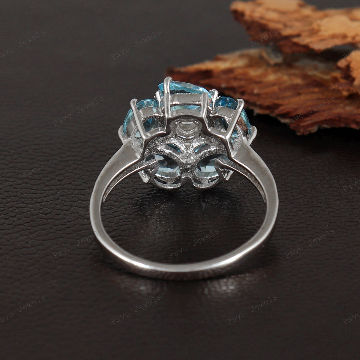 Swiss Blue Topaz Flower Ring: Sterling Silver November Birthstone