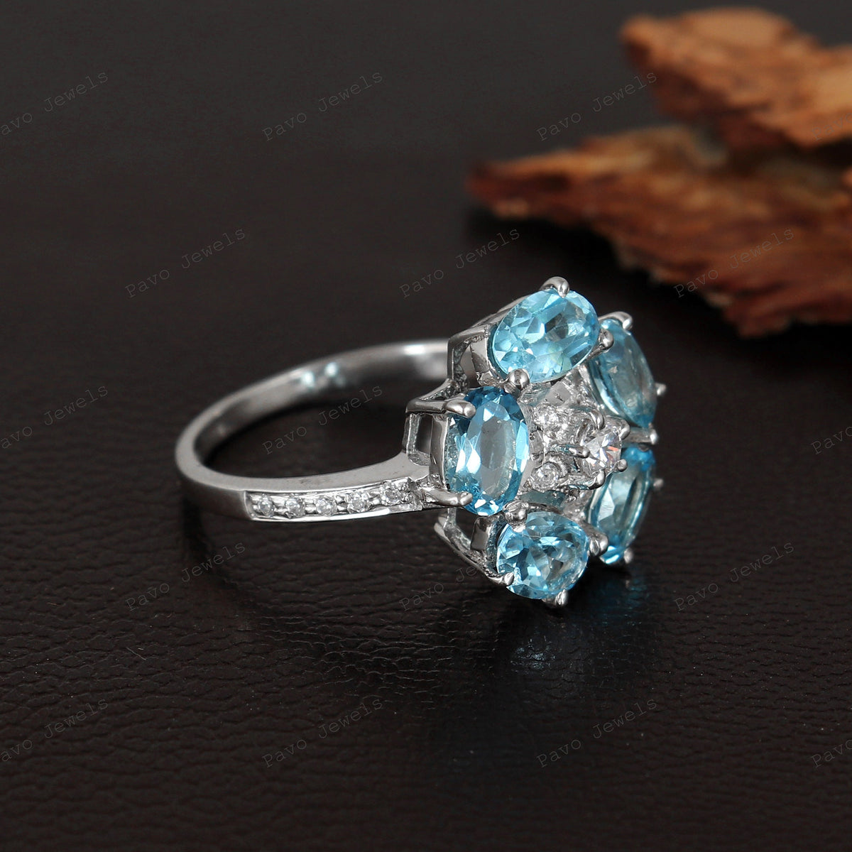 Swiss Blue Topaz Flower Ring: Sterling Silver November Birthstone