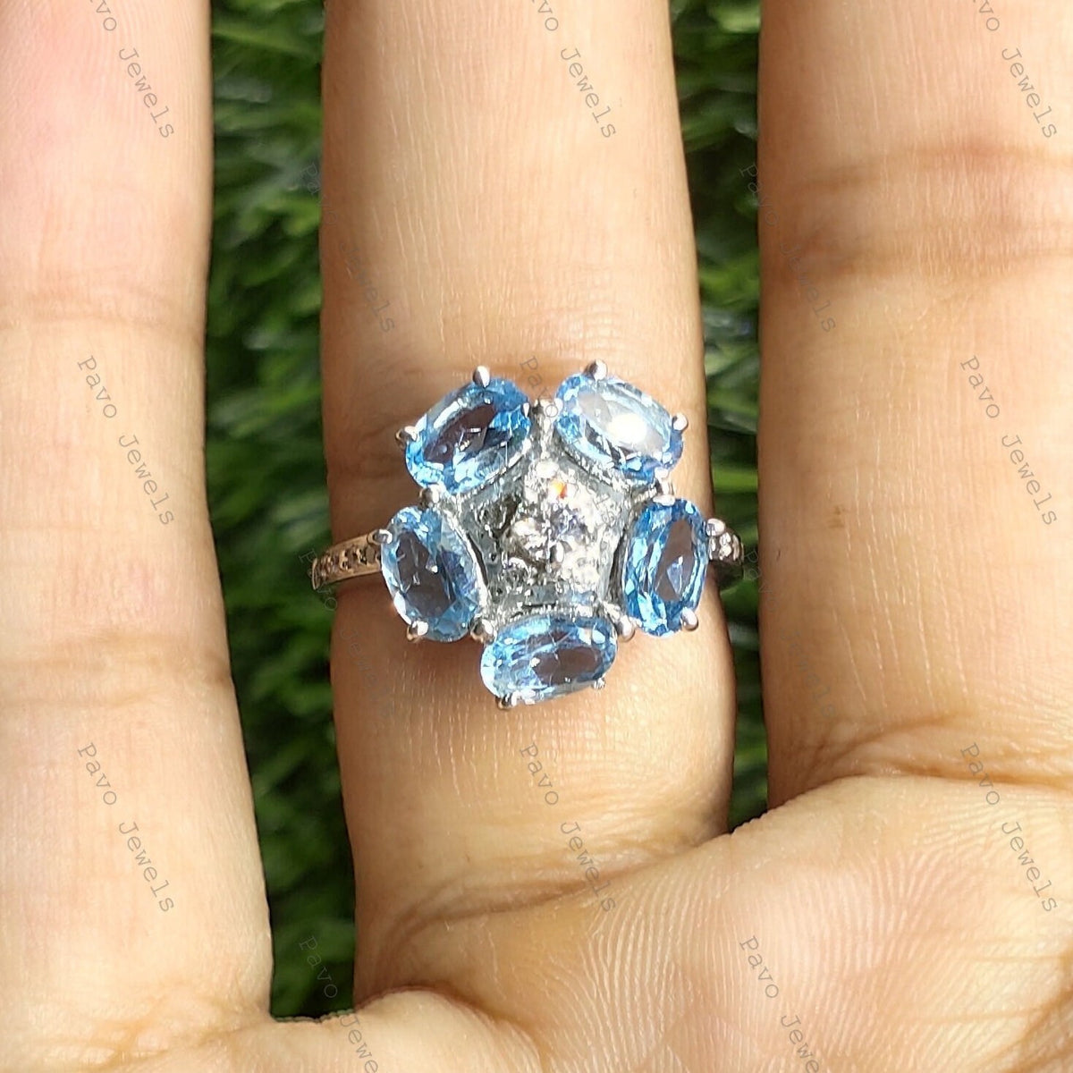 Swiss Blue Topaz Flower Ring: Sterling Silver November Birthstone