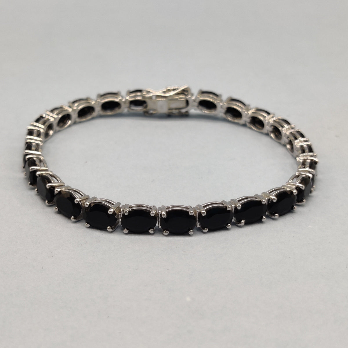 Black Onyx Tennis Bracelet: Oval Gemstone, 925 Sterling Silver