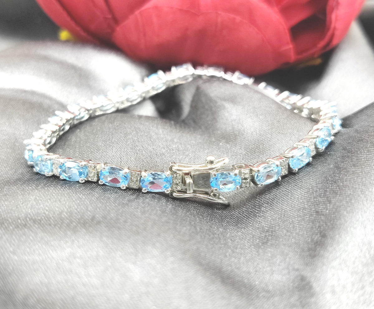 Swiss Blue Topaz Tennis Bracelet, December Birthstone, Sterling Silver, Oval Gemstone Jewelry