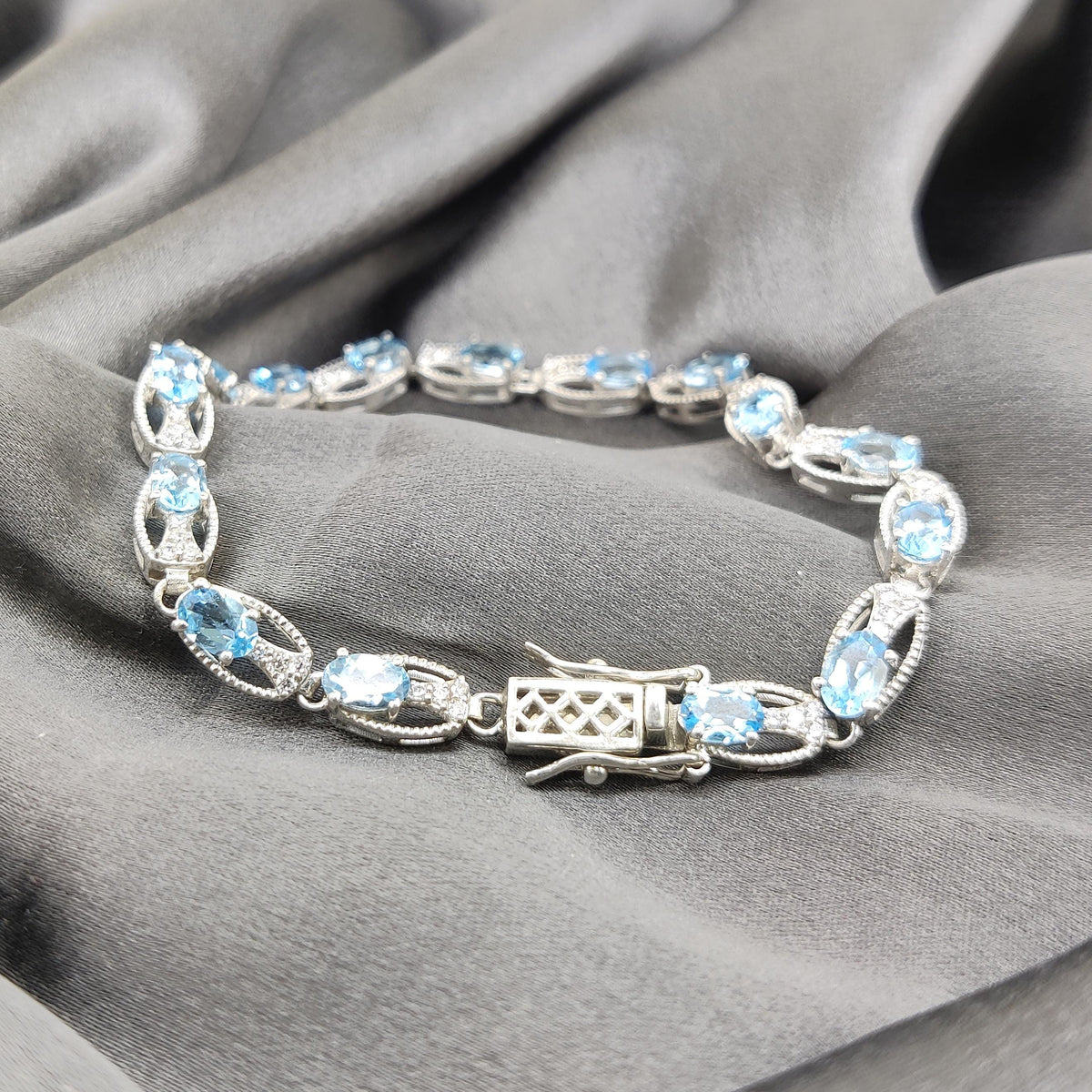 Swiss Blue Topaz Tennis Bracelet: Sterling Silver, December Birthstone, Handmade Gemstone Oval Jewelry