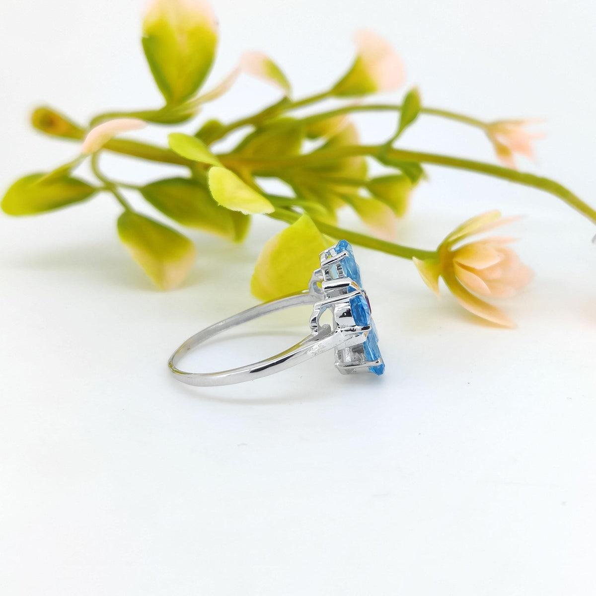 Swiss Blue Topaz Flower Ring: Sterling Silver December Birthstone