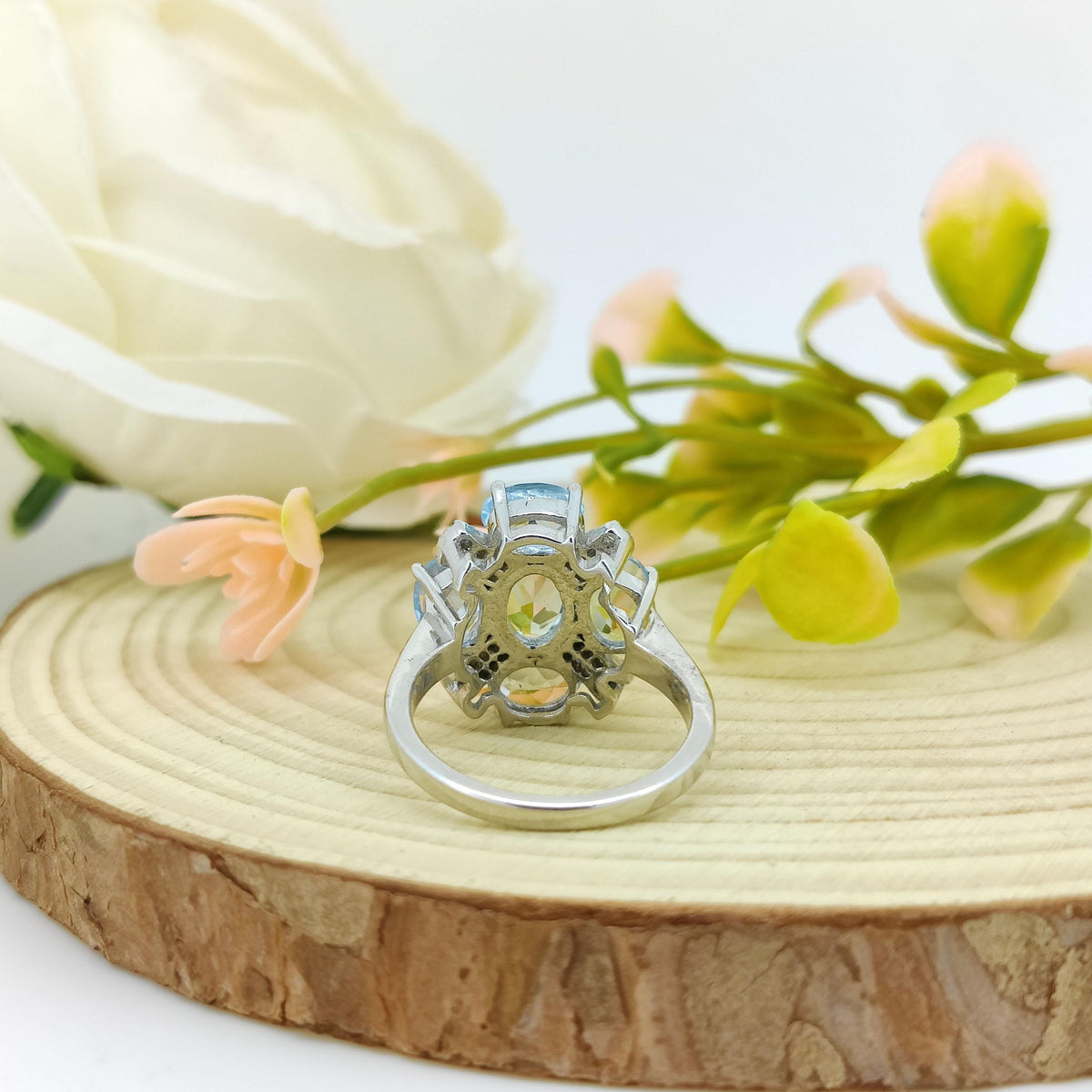 Blue Topaz Flower Ring: Sterling Silver December Birthstone