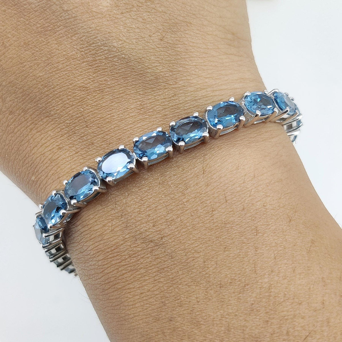 London Blue Topaz Tennis Bracelet: Sterling Silver Oval Gemstone, December Birthstone