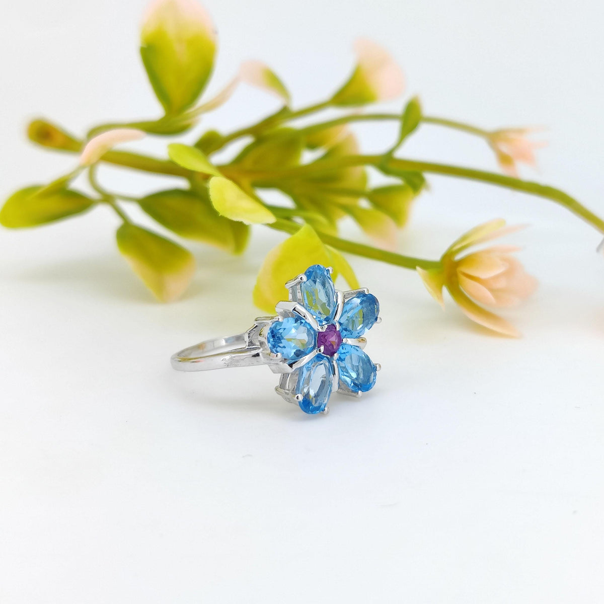 Swiss Blue Topaz Flower Ring: Sterling Silver December Birthstone