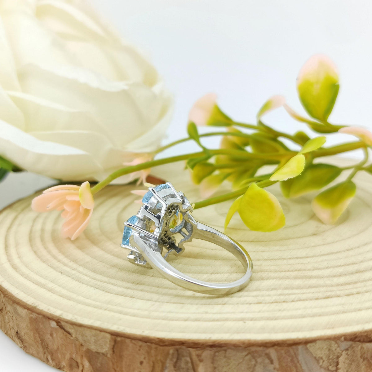 Blue Topaz Flower Ring: Sterling Silver December Birthstone