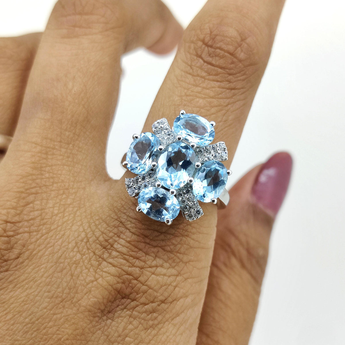 Blue Topaz Flower Ring: Sterling Silver December Birthstone
