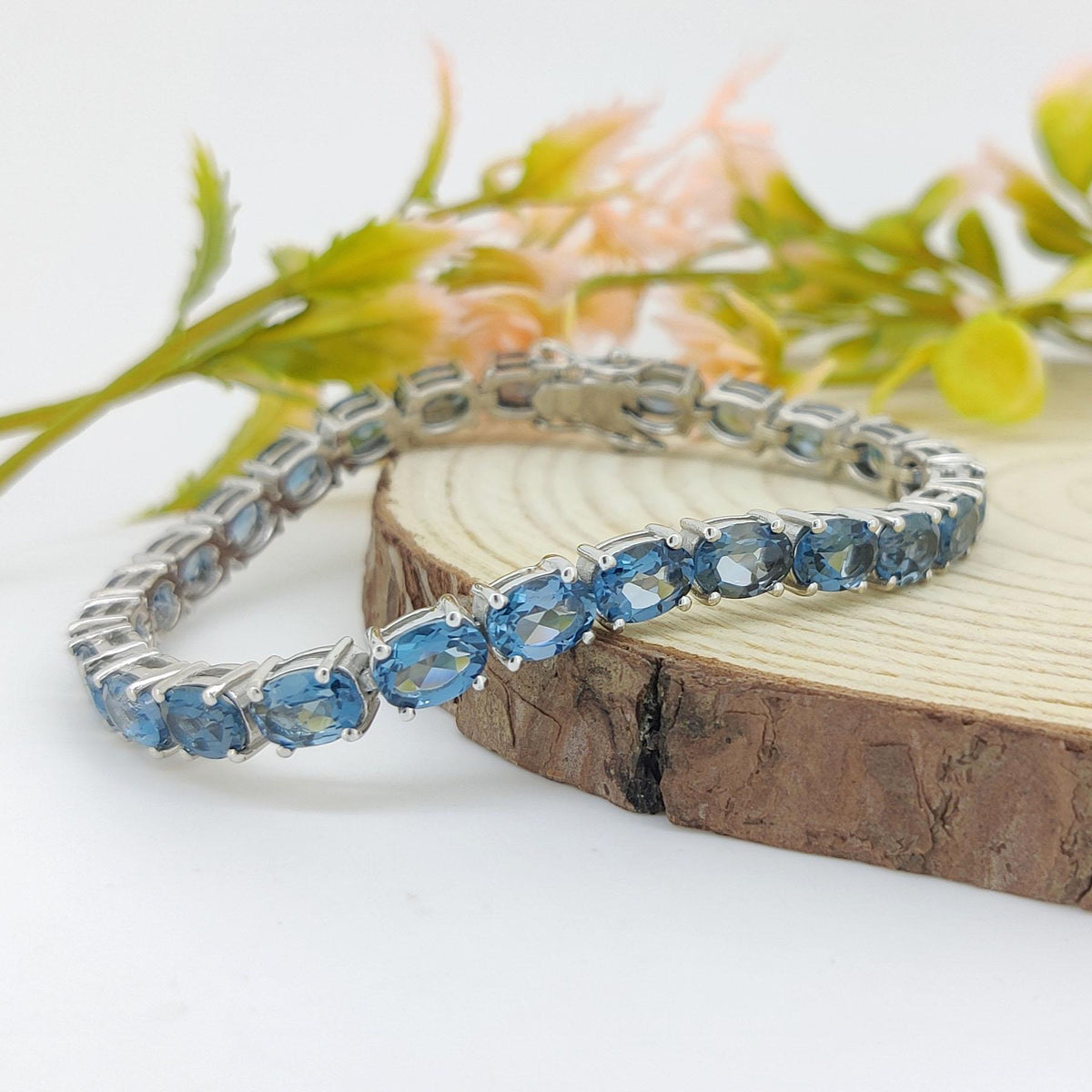 London Blue Topaz Tennis Bracelet: Sterling Silver Oval Gemstone, December Birthstone
