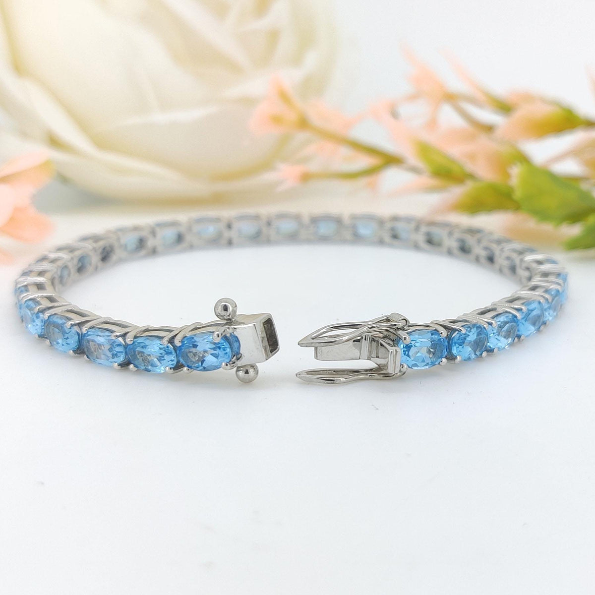 Swiss Blue Topaz Tennis Bracelet: Sterling Silver Oval Gemstone, December Birthstone