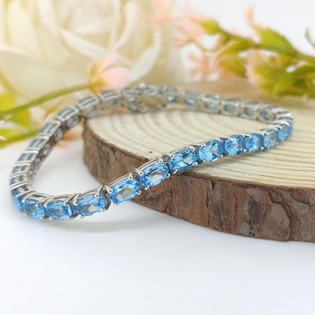 Swiss Blue Topaz Tennis Bracelet: Sterling Silver Oval Gemstone, December Birthstone