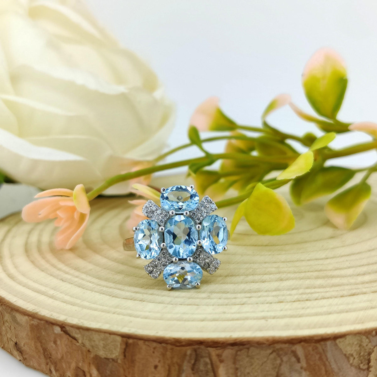 Blue Topaz Flower Ring: Sterling Silver December Birthstone