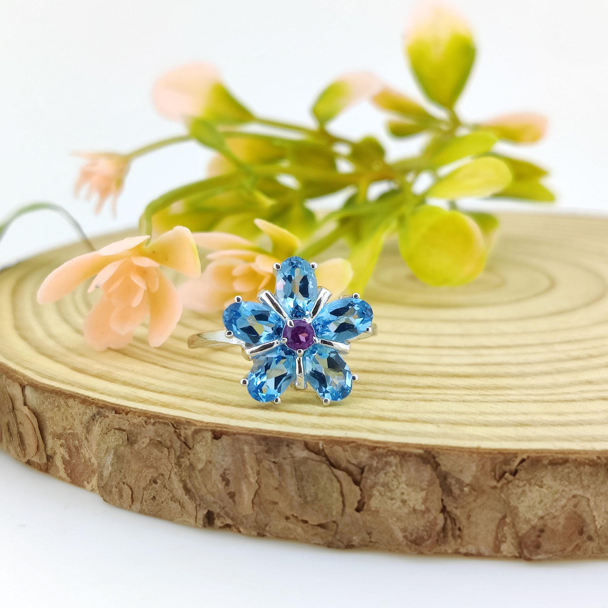 Swiss Blue Topaz Flower Ring: Sterling Silver December Birthstone