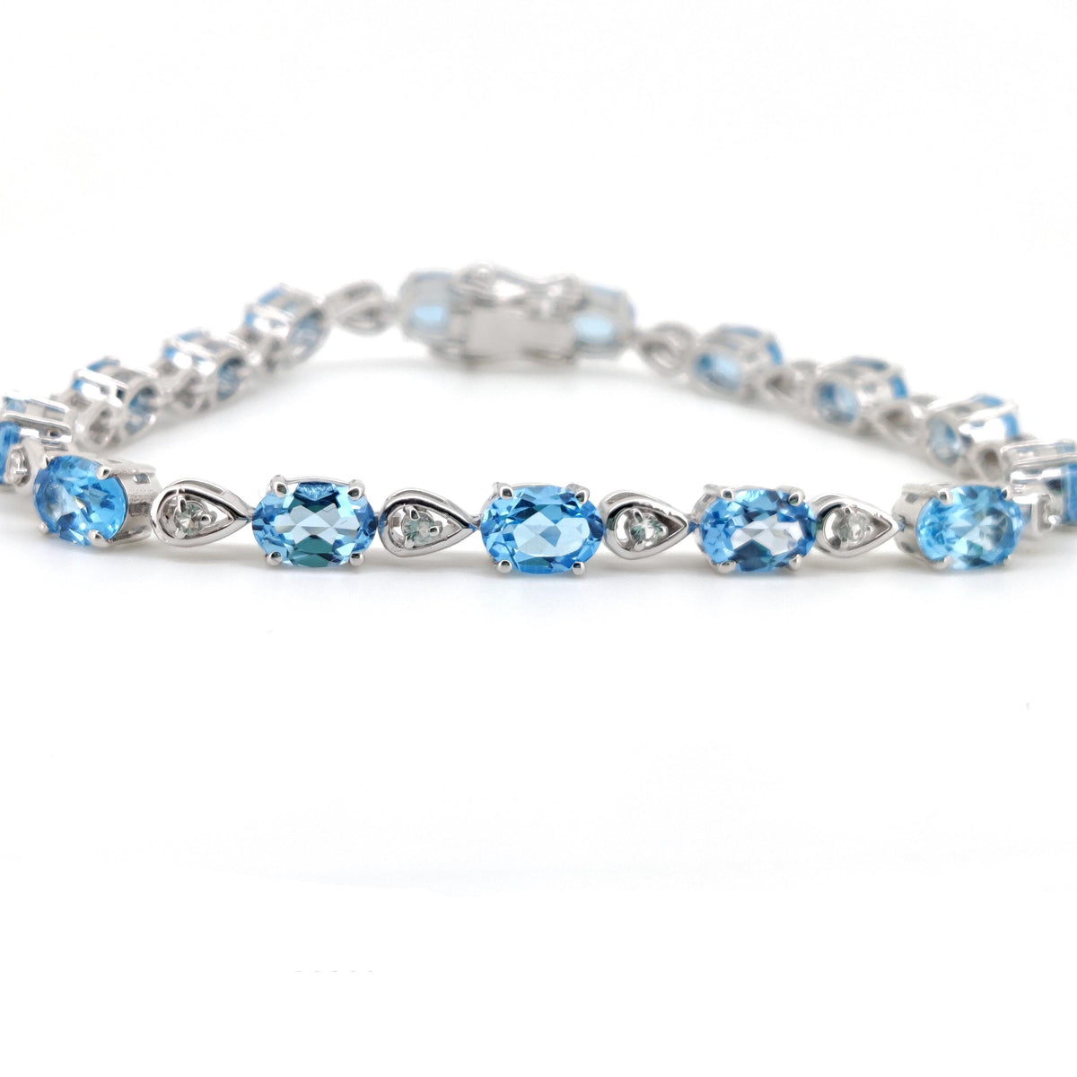 Sterling Silver Swiss Blue Topaz Tennis Bracelet, December Birthstone, Oval Gemstone Dainty Bangle