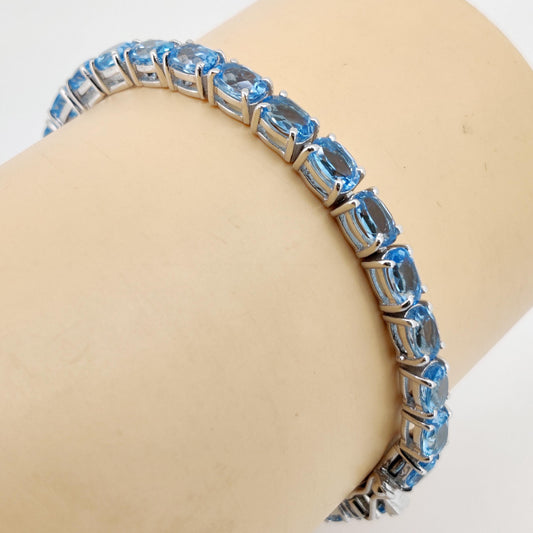 Oval Swiss Blue Topaz Tennis Bracelet, Sterling Silver, December Birthstone