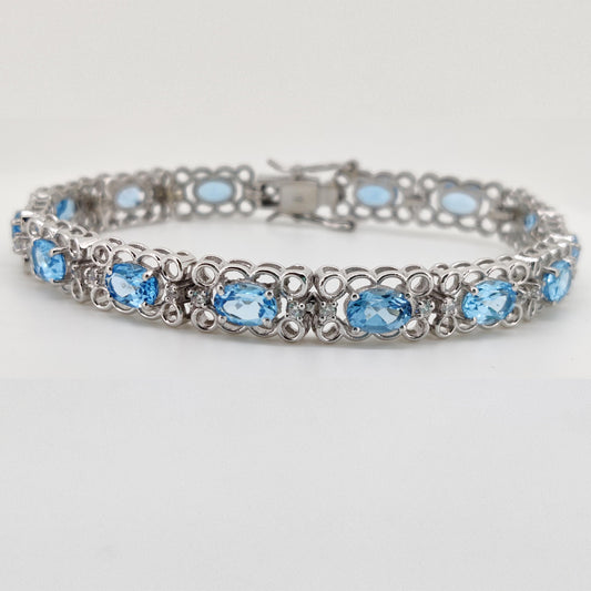 Oval Swiss Blue Topaz Tennis Bracelet | 925 Sterling Silver, 5x7mm Gemstone, December Birthstone