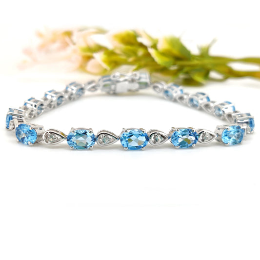 Sterling Silver Swiss Blue Topaz Tennis Bracelet, December Birthstone, Oval Gemstone Dainty Bangle