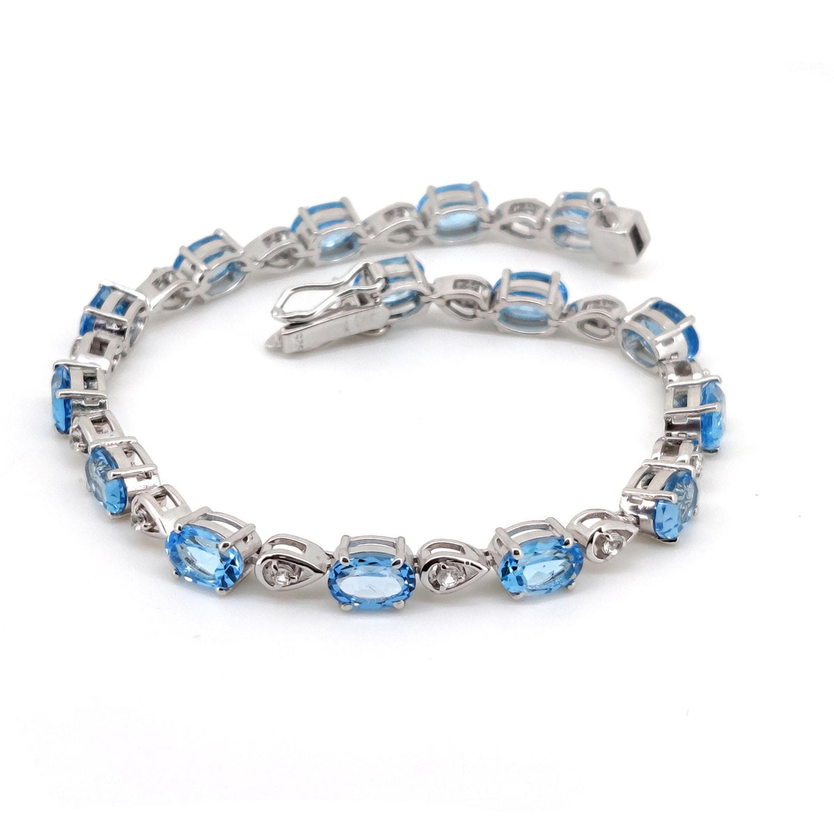 Sterling Silver Swiss Blue Topaz Tennis Bracelet, December Birthstone, Oval Gemstone Dainty Bangle