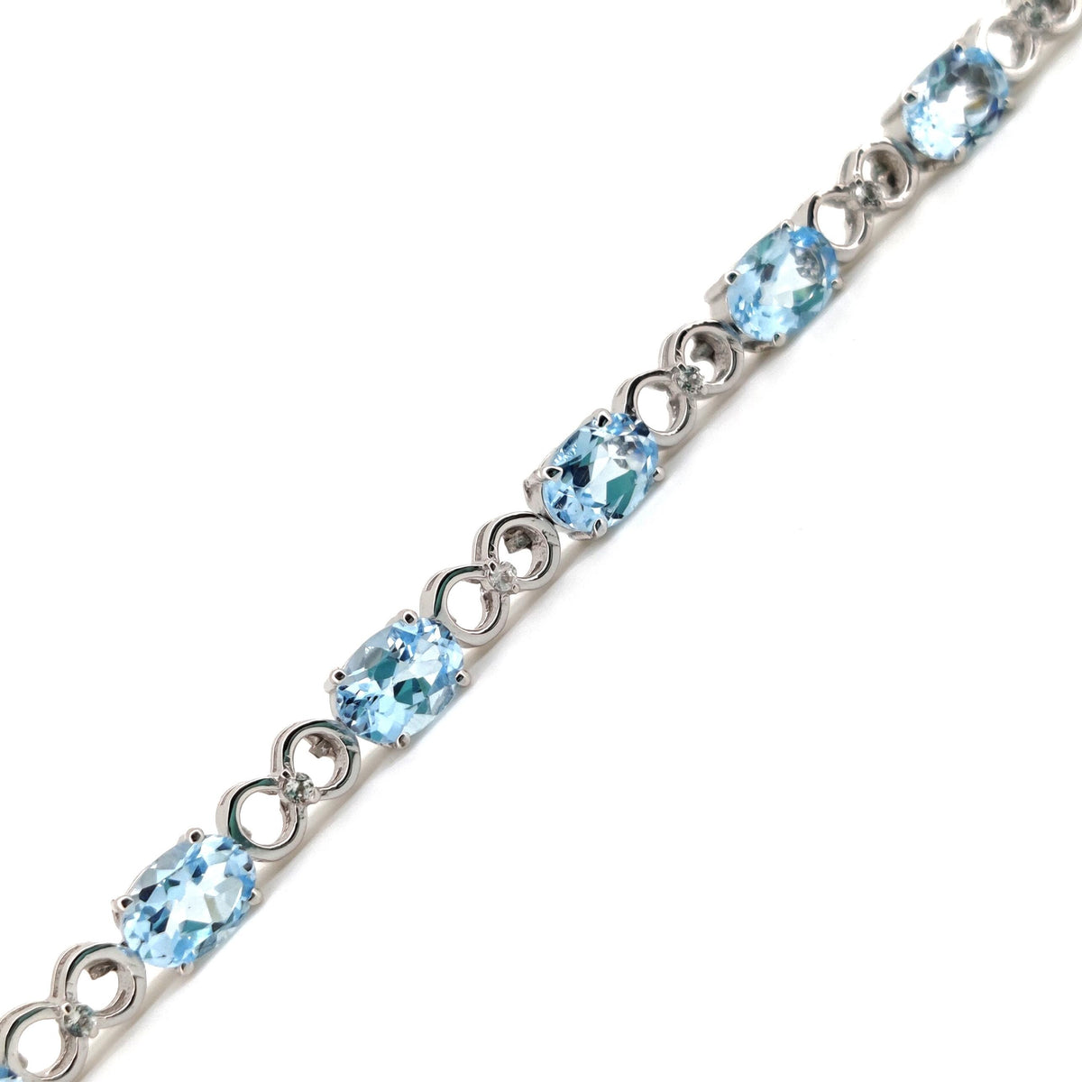 Sterling Silver Blue Topaz Tennis Bracelet, December Birthstone, Oval Gemstone Jewelry