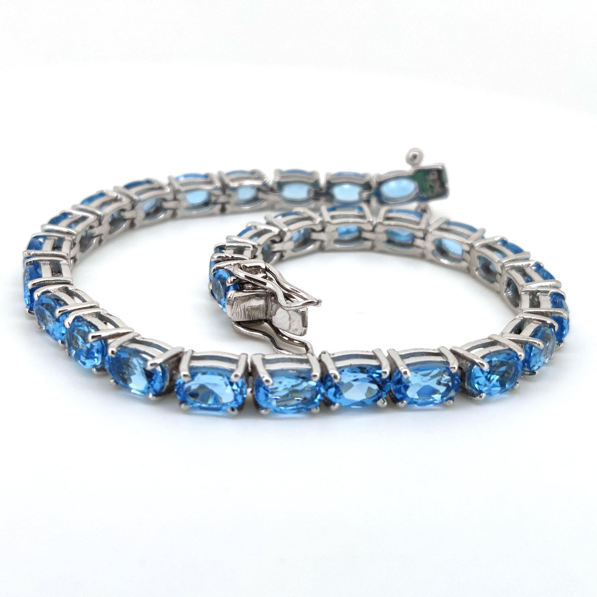 Oval Swiss Blue Topaz Tennis Bracelet, Sterling Silver, December Birthstone