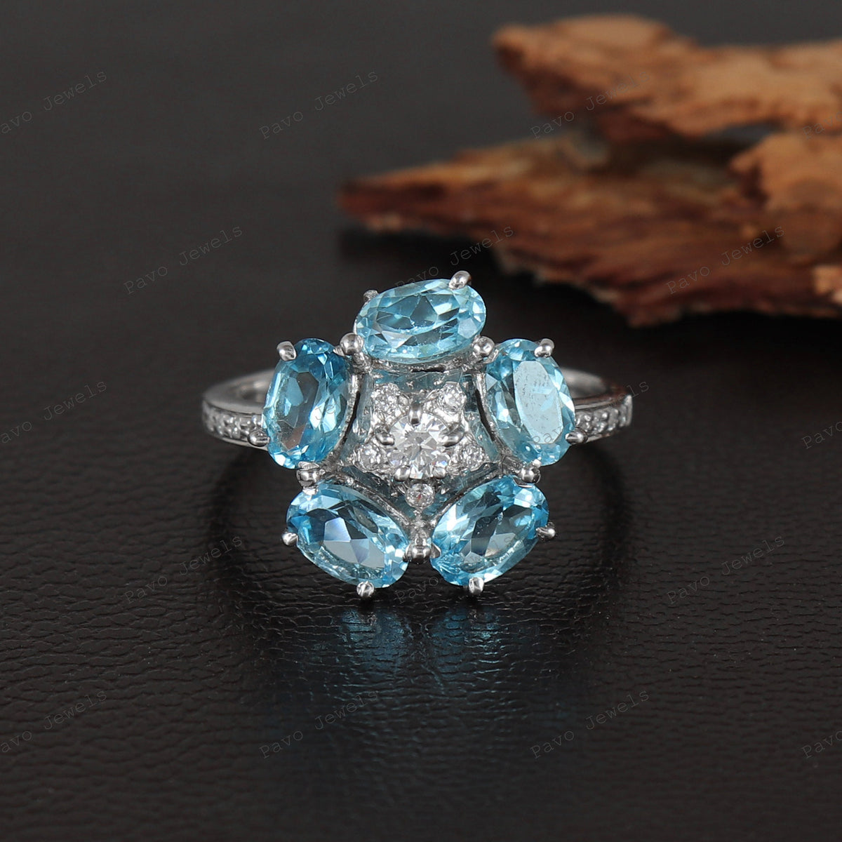Swiss Blue Topaz Flower Ring: Sterling Silver November Birthstone