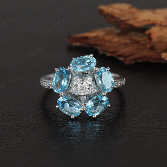 Swiss Blue Topaz Flower Ring: Sterling Silver November Birthstone