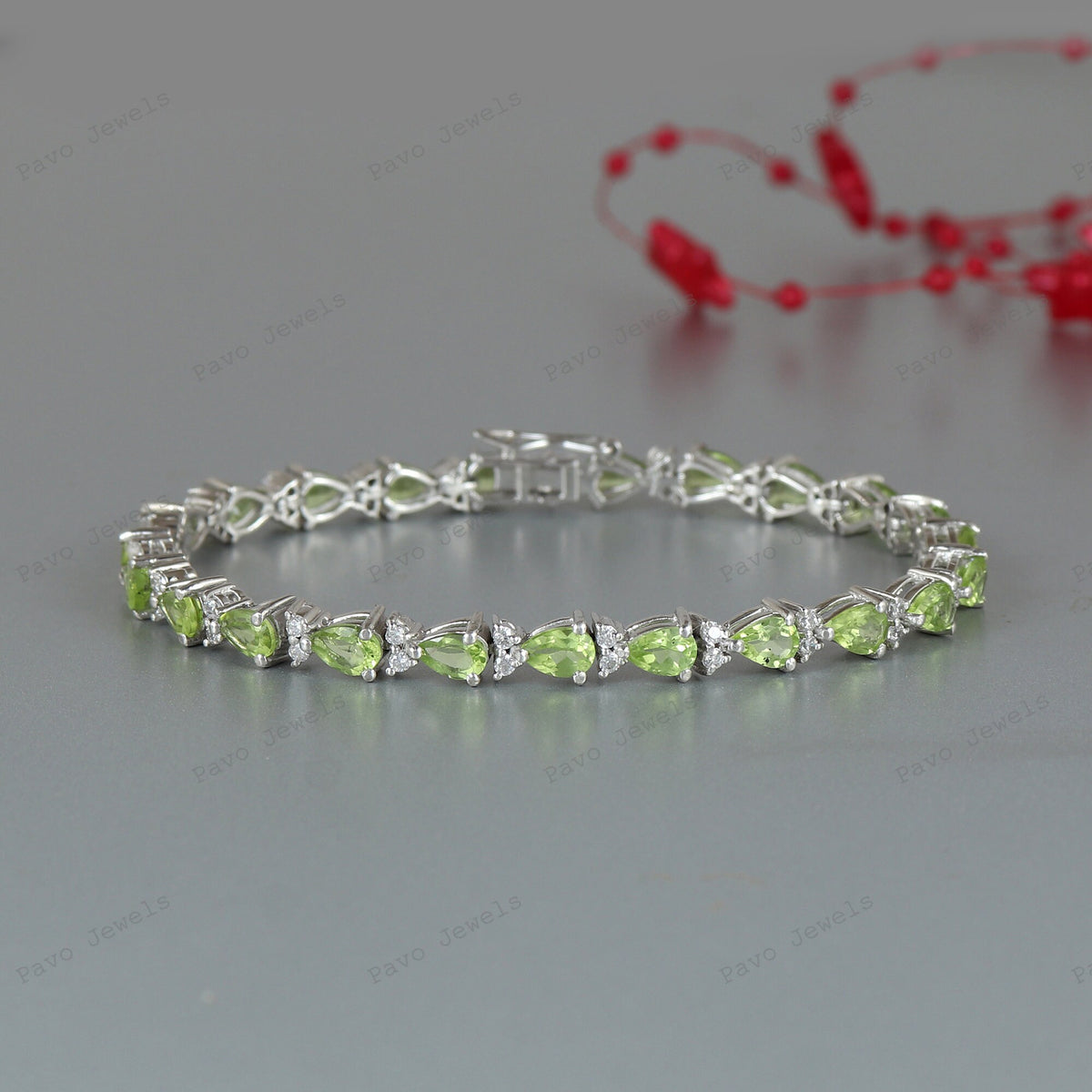 Peridot Pear Cut Tennis Bracelet: 925 Sterling Silver, August Birthstone