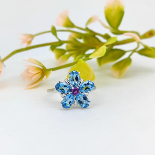 Swiss Blue Topaz Flower Ring: Sterling Silver December Birthstone