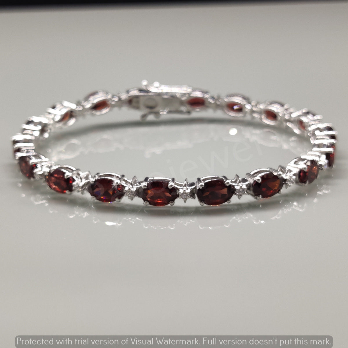Faceted Oval Garnet Tennis Bracelet, 925 Sterling Silver