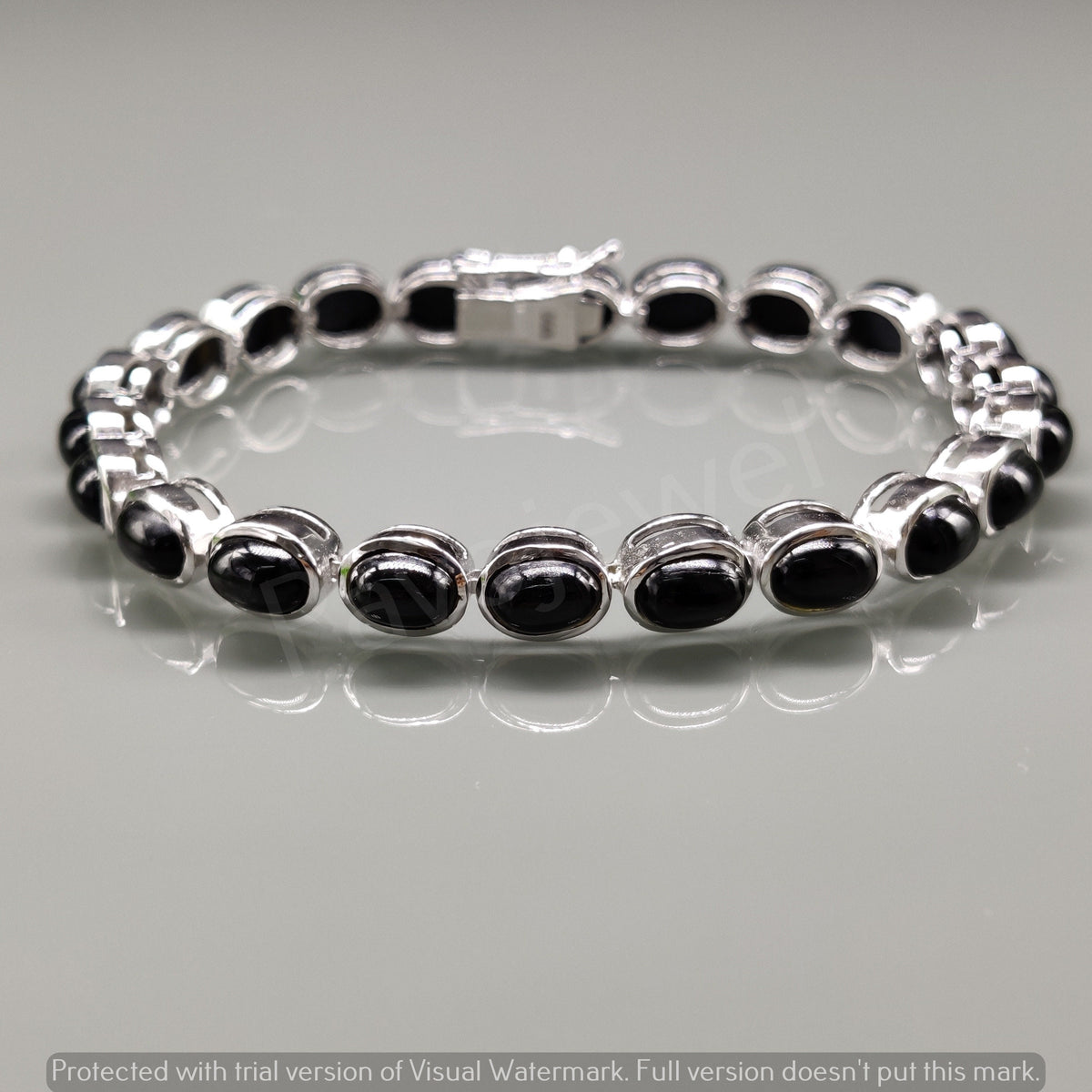 Natural Black Star Oval Cabochon Sterling Silver Bracelet, Tennis Style
